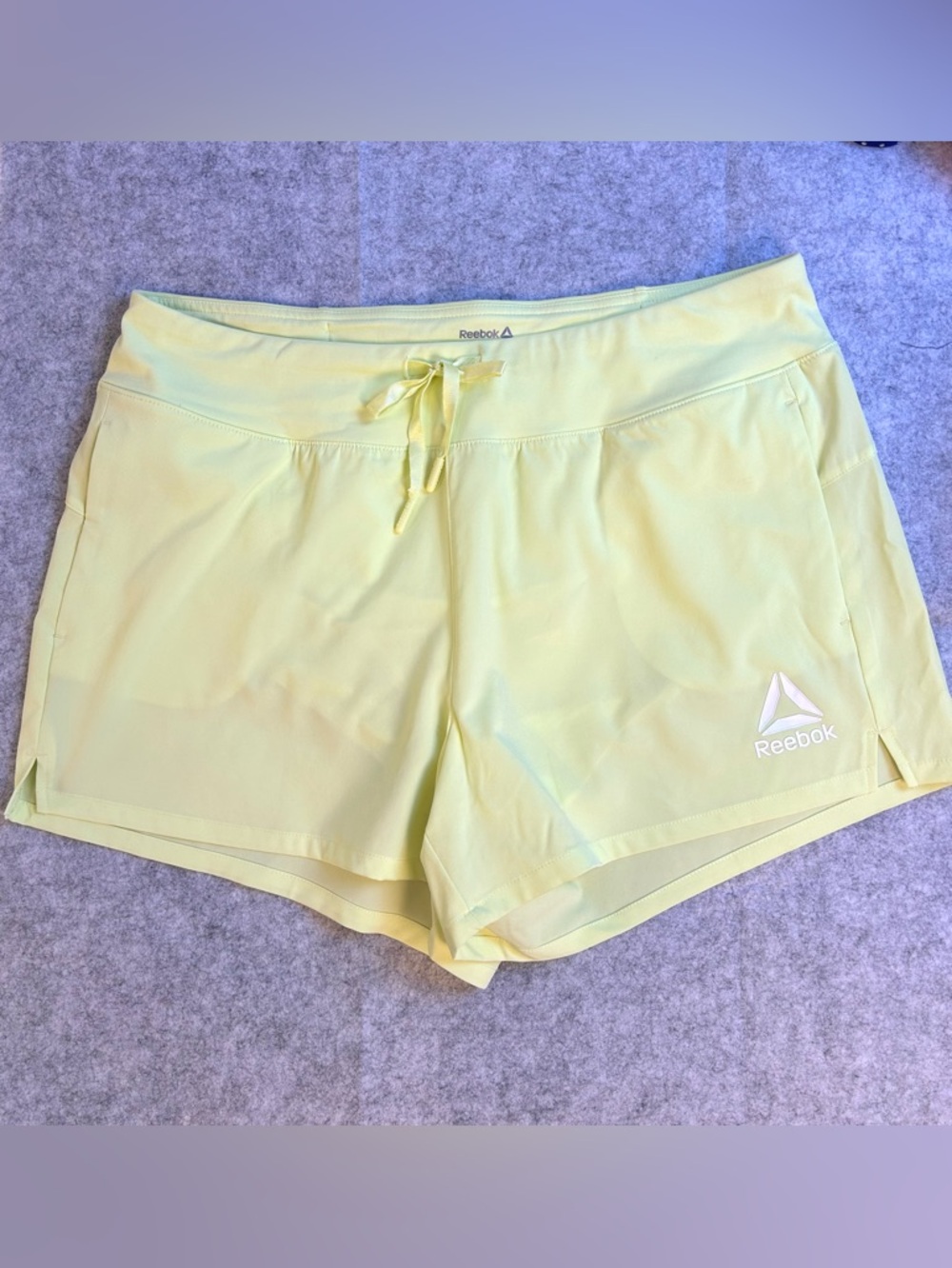 Reebok Women’s 3” Revolve Running, Moisture Wicking, Zip Back Waist Pocket / Lg